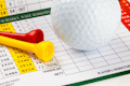 Golf Scorecard with Ball and Tees